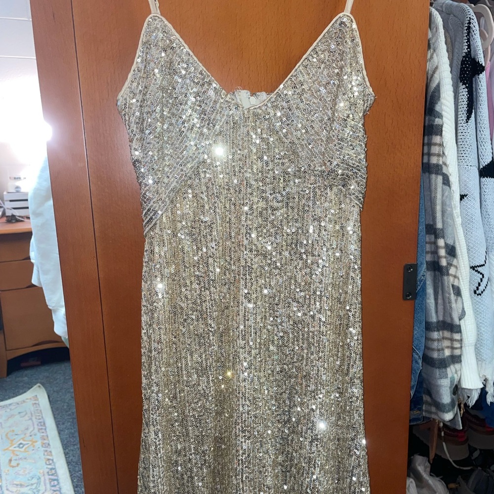 Fun sequin dress!! Mini length with cute details. Never worn before.